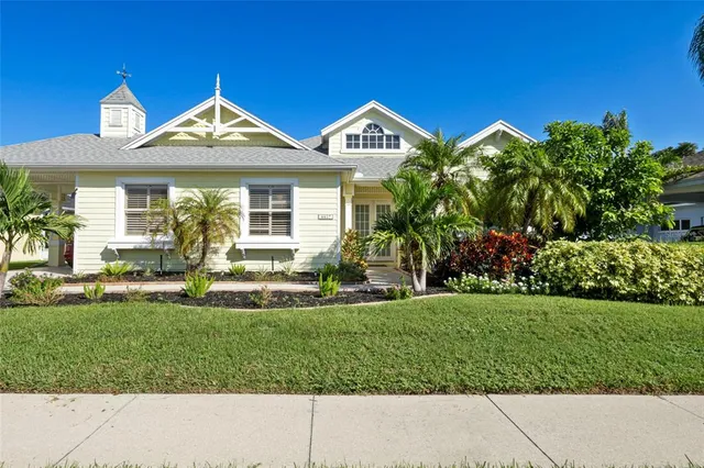 a bathroom with a sink a vanity and a bathtub