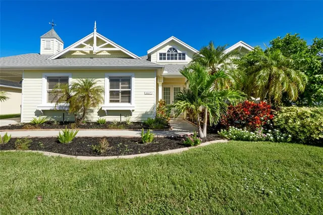 a white toilet sitting next to a shower