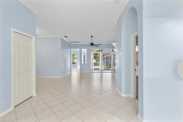 a white bath tub sitting next to a white toilet