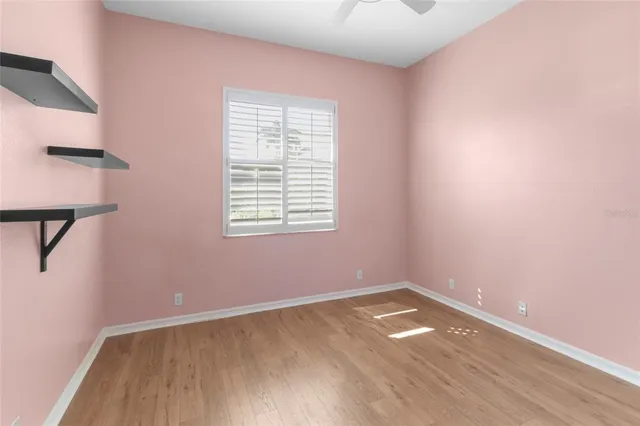 a view of a chairs and table in the garden