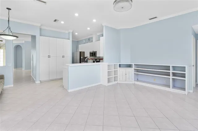 an aerial view of residential houses with outdoor space and street view