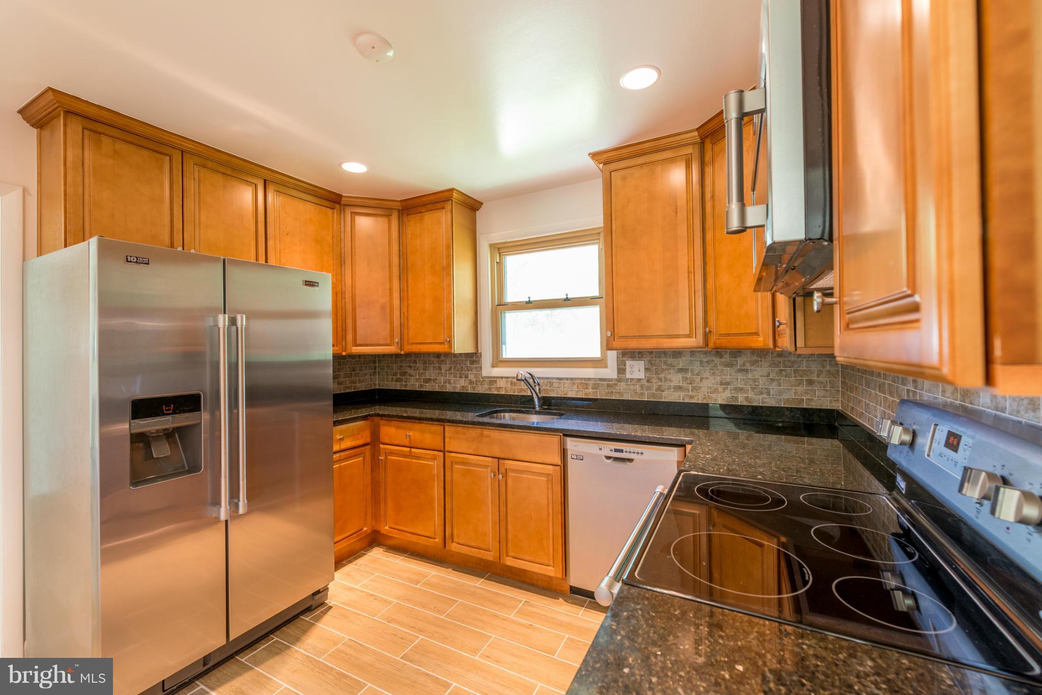12430 Littleton Street Silver Spring, MD 20906 - Photo 5 of 28 Renovated Kitchen - Granite Counters