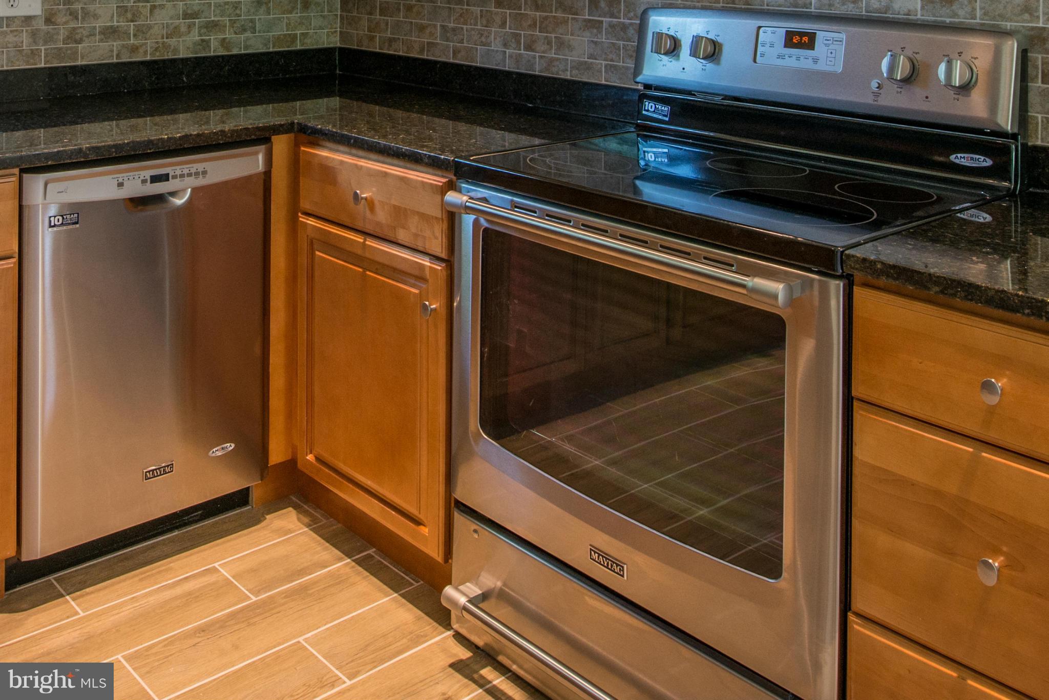 12430 Littleton Street Silver Spring, MD 20906 - Photo 8 of 28 New range and dishwasher!