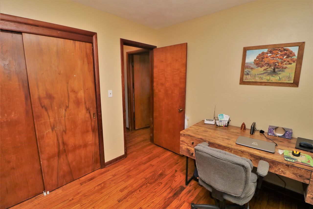 16127 Edwardsville Road Pecatonica, IL 61063 - Photo 19 of 26 a room with a table and chairs