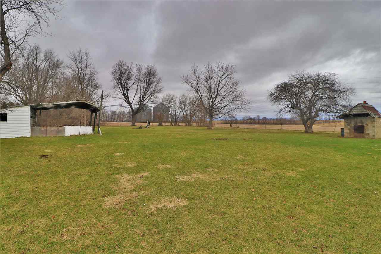 16127 Edwardsville Road Pecatonica, IL 61063 - Photo 25 of 26 a view of swimming pool with an outdoor space and seating area
