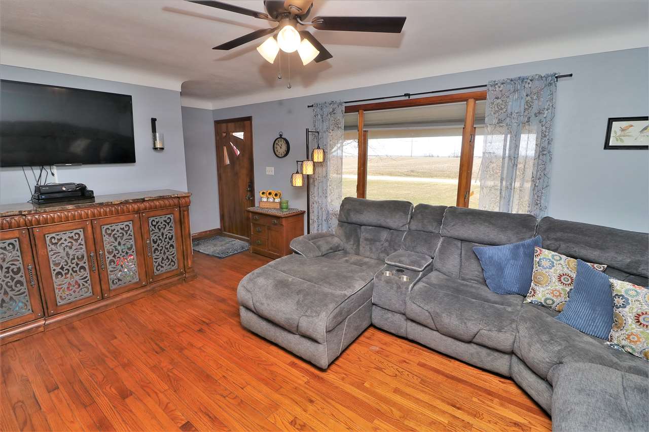 16127 Edwardsville Road Pecatonica, IL 61063 - Photo 3 of 26 a living room with furniture and a flat screen tv