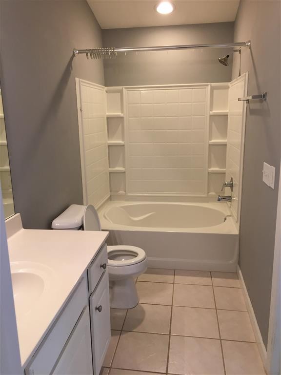 1101 Downs Boulevard, Unit 125 Franklin, TN 37064 - Photo 7 of 8 a bathroom with a bathtub and a shower