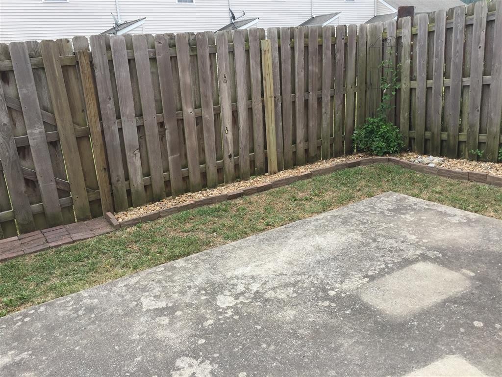 1101 Downs Boulevard, Unit 125 Franklin, TN 37064 - Photo 8 of 8 a view of a wooden fence