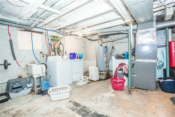 a view of a room with storage and utility room