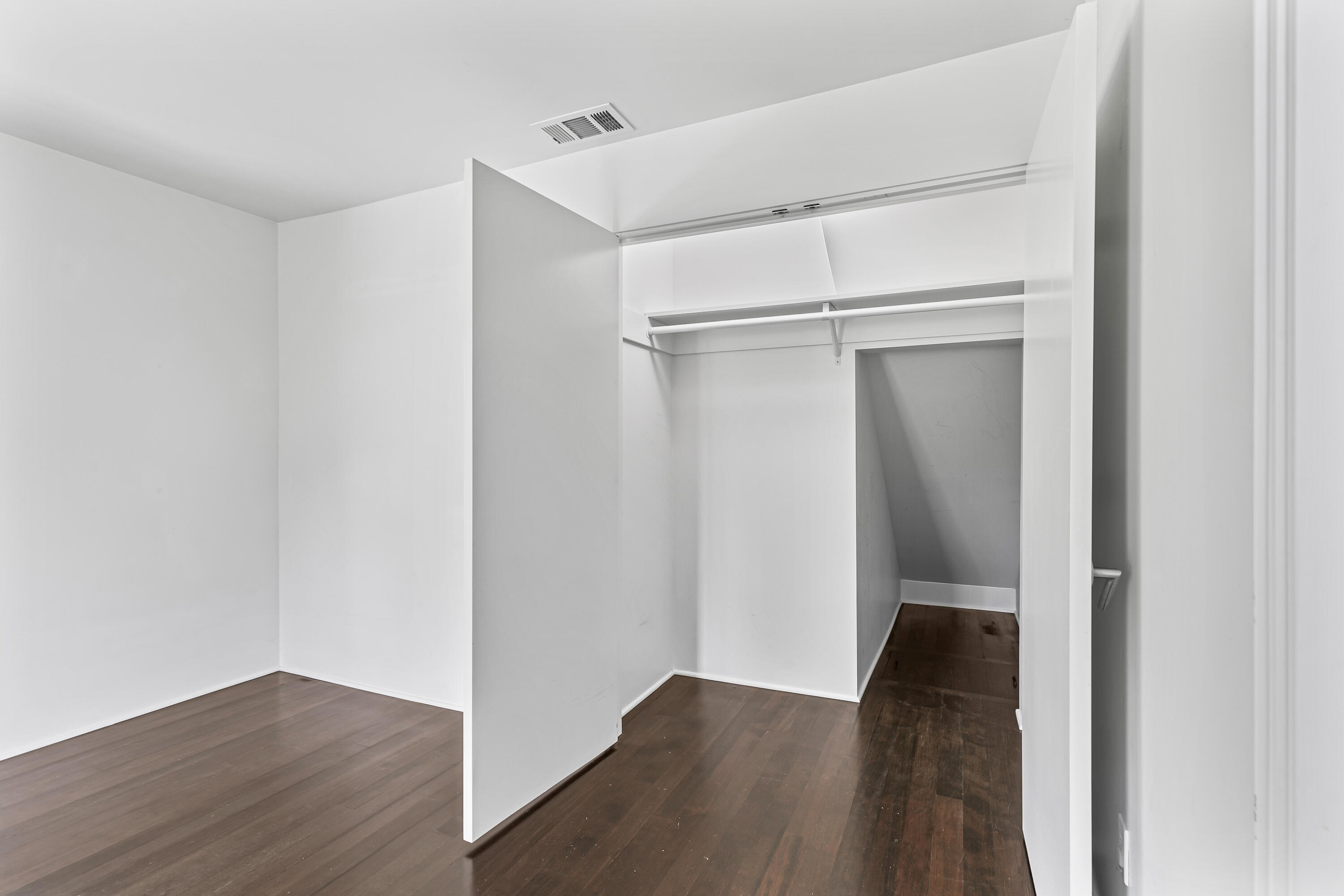 593 Crowson Road Ashland, OR 97520 - Photo 20 of 36 a view of an empty walk in closet with wooden floor and closet