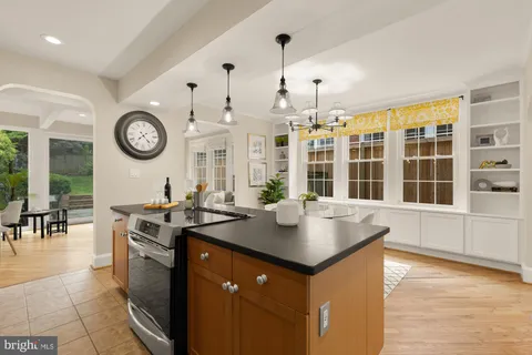a kitchen with lots of counter space and a window