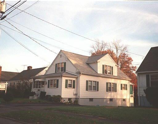46 Hirsch Road Stamford, CT 06905 - Photo 1 of 1 a front view of a house with windows
