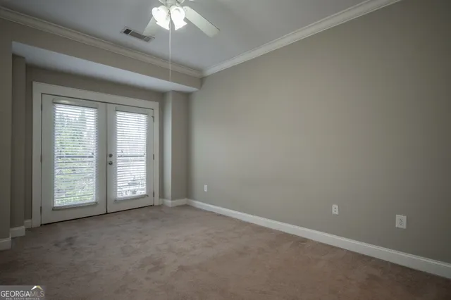 a view of a room with a hallway
