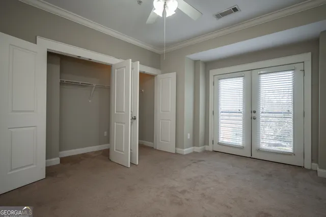 a view of a room with racks on the wall