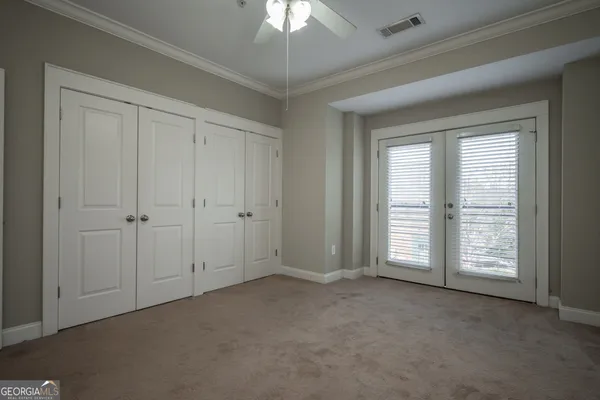 an empty room with a empty space and a window