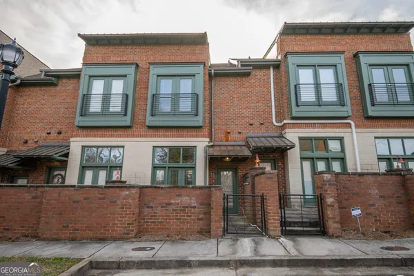 a front view of residential houses