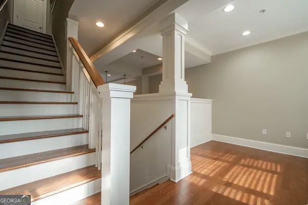 a view of entryway with wooden floor