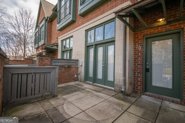 a kitchen with a stove and a wooden bench