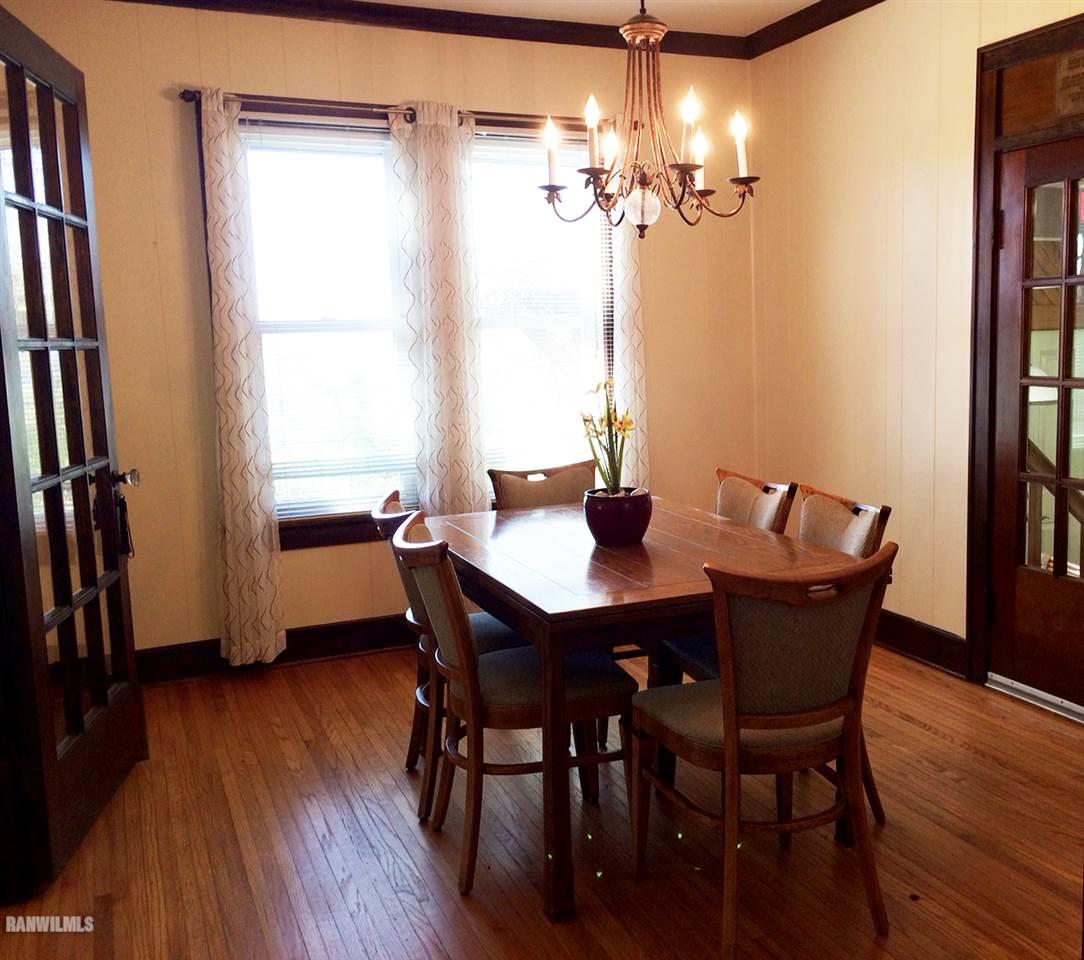 364 East U Route South Elizabeth, IL 61028 - Photo 8 of 20 a view of a dining room with furniture window and wooden floor
