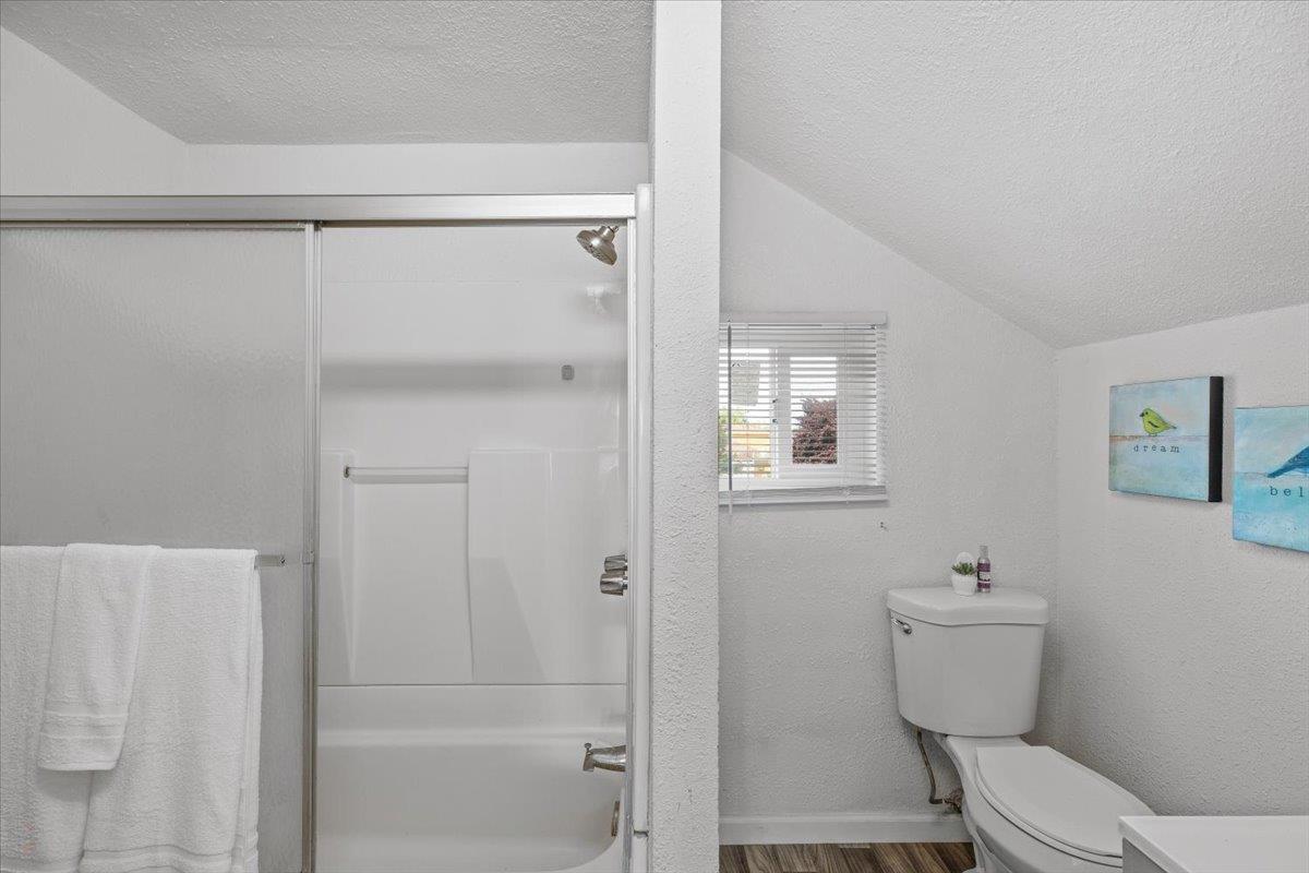 572 Pedersen Road Oakdale, CA 95361 - Photo 29 of 36 a bathroom with a toilet and a shower