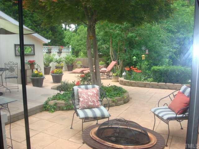 823 Graham Street Raleigh, NC 27605 - Photo 2 of 12 a patio with water view fountain and outdoor seating