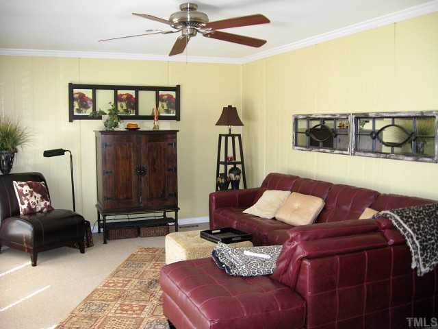 823 Graham Street Raleigh, NC 27605 - Photo 5 of 12 a living room with furniture and wooden floor