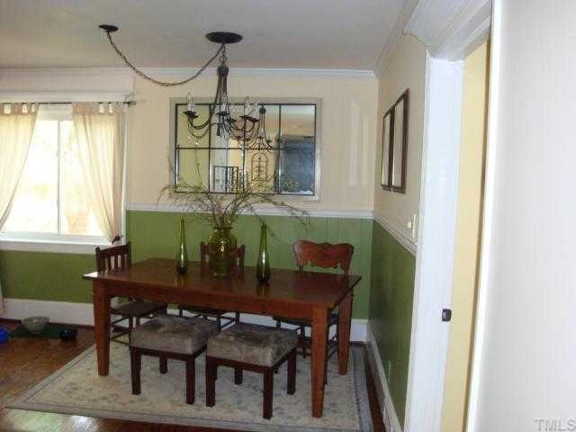 823 Graham Street Raleigh, NC 27605 - Photo 6 of 12 a view of a dining room with furniture and window