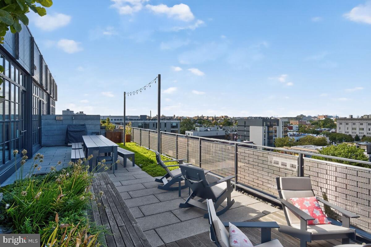 2030 8th Street Northwest, Unit 507 Washington, DC 20001 - Photo 20 of 23 a view of a terrace with couches