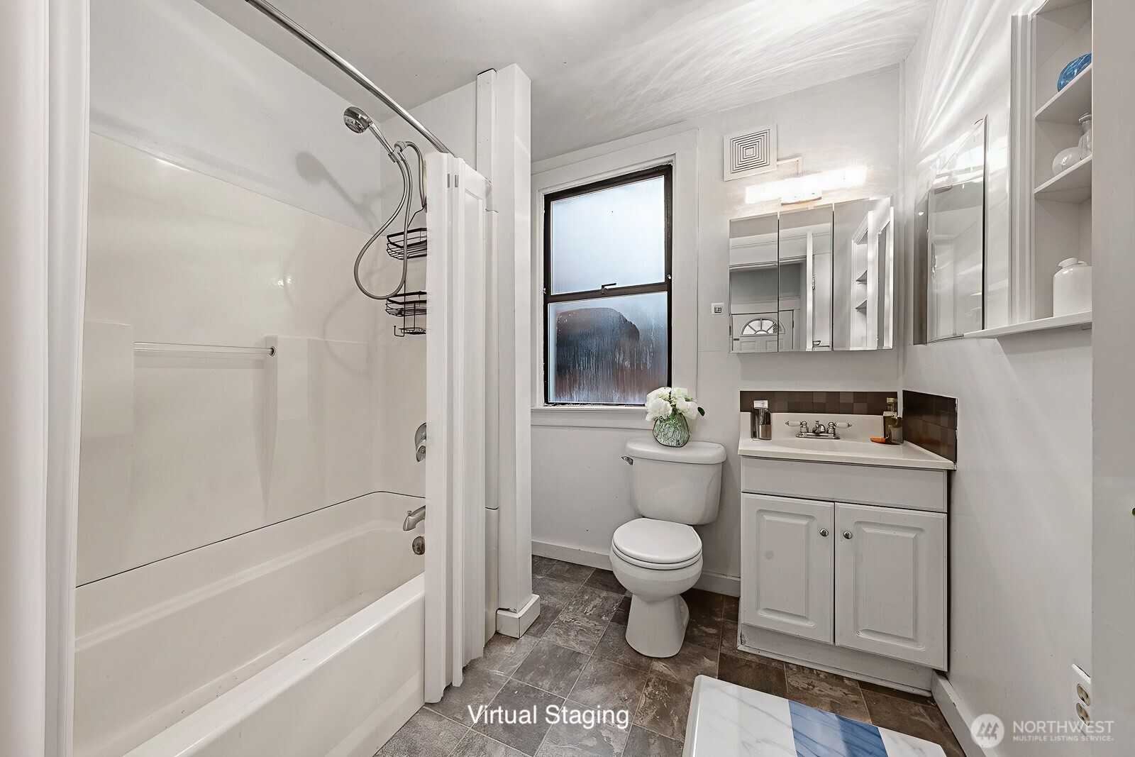 6636 Carleton Avenue South Seattle, WA 98108 - Photo 12 of 30 a bathroom with a sink toilet and shower