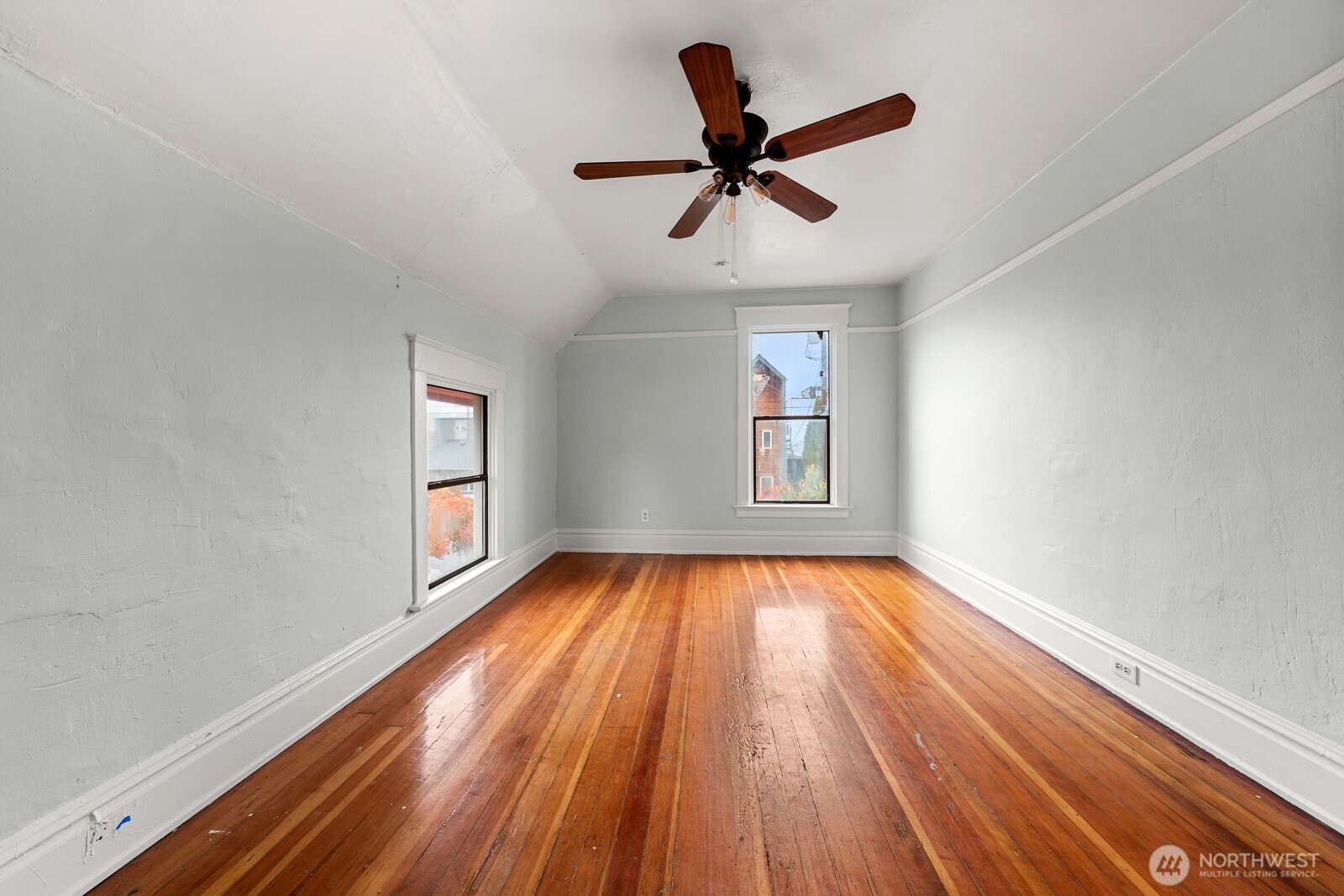 6636 Carleton Avenue South Seattle, WA 98108 - Photo 17 of 30 a view of empty room with wooden floor and fan