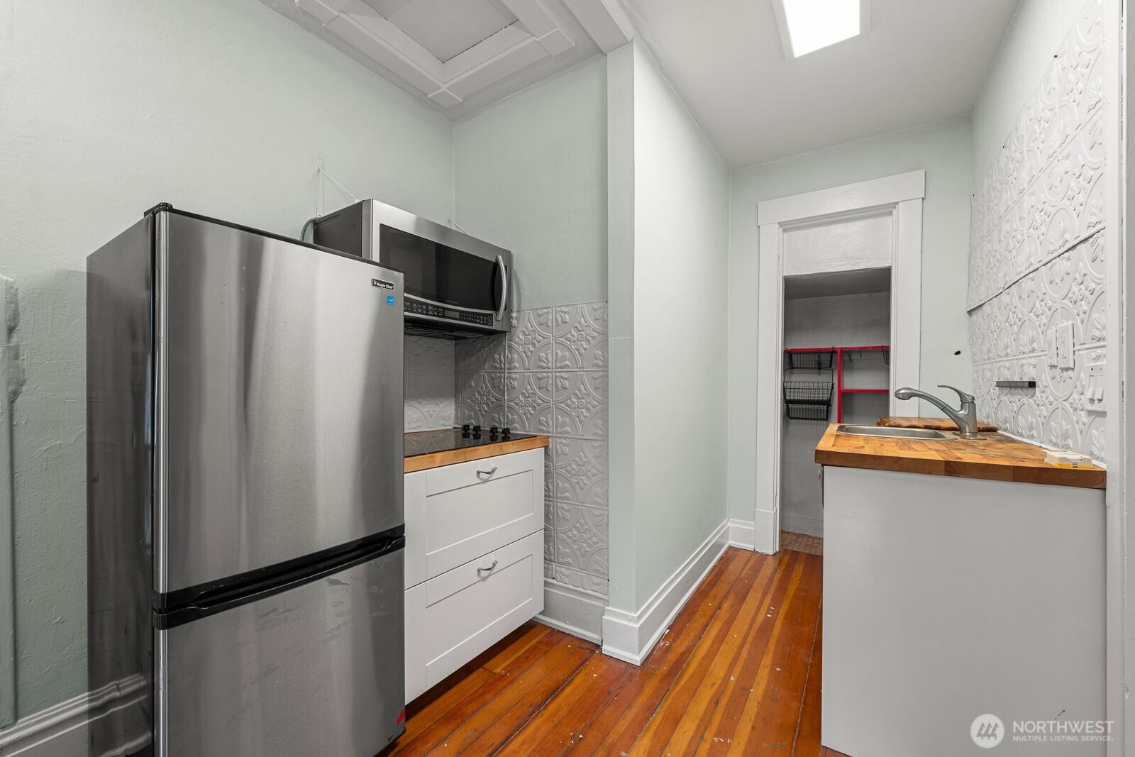 6636 Carleton Avenue South Seattle, WA 98108 - Photo 18 of 30 a kitchen with stainless steel appliances a refrigerator and a sink