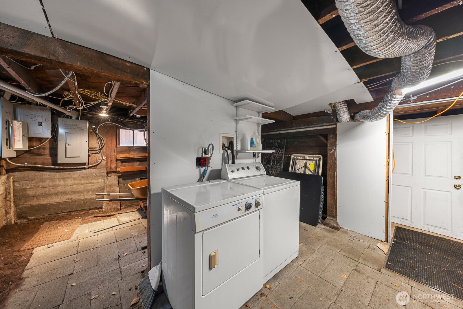 6636 Carleton Avenue South Seattle, WA 98108 - Photo 26 of 30 a utility room with cabinets