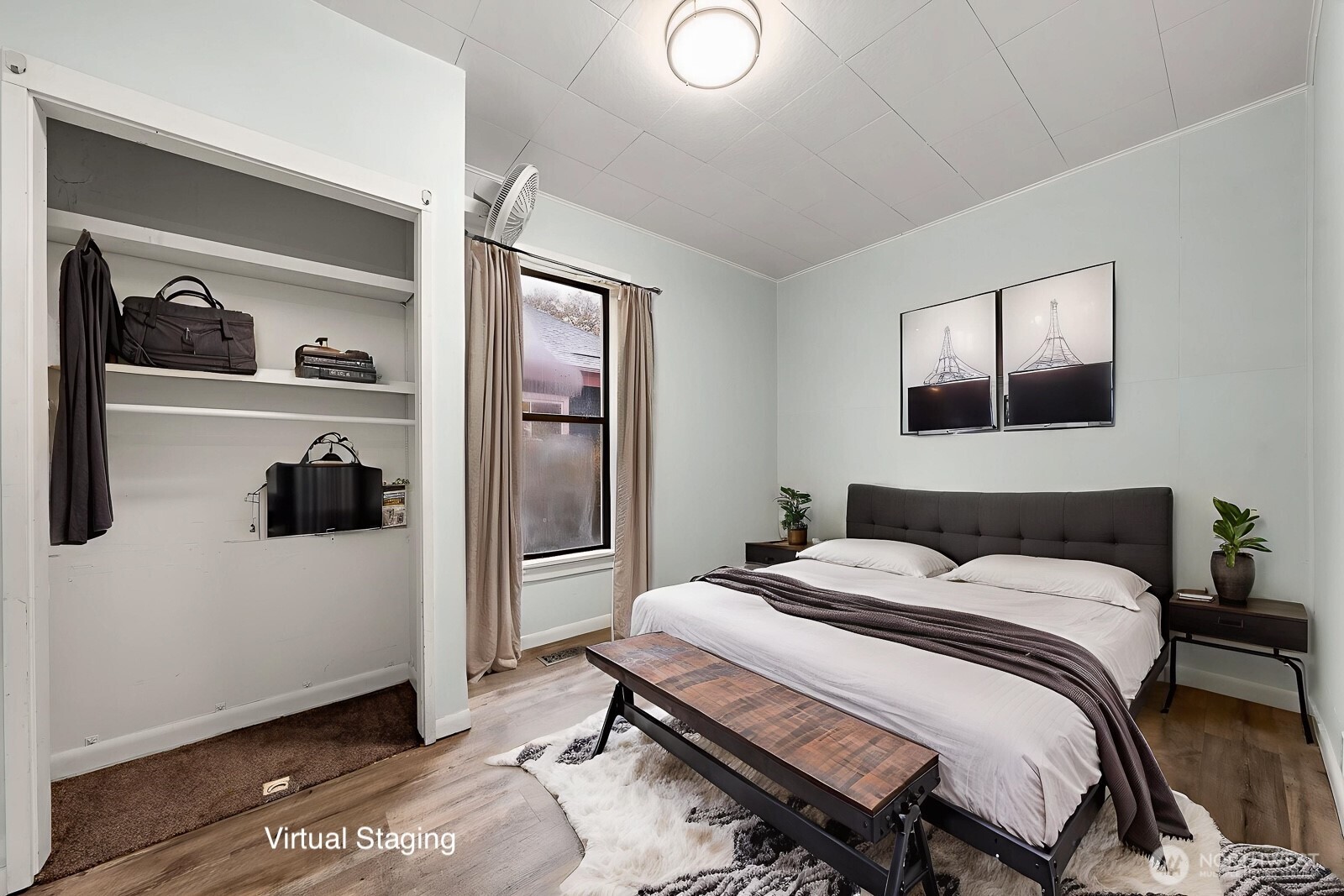 6636 Carleton Avenue South Seattle, WA 98108 - Photo 7 of 30 a bedroom with a bed and a window