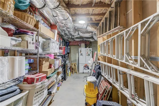 a roof deck with furniture and a chandelier