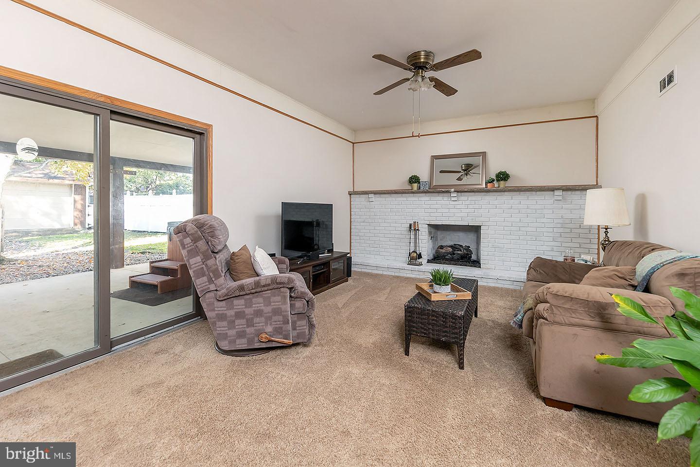 2 Spring Court Cherry Hill, NJ 08003 - Photo 12 of 27 Family Room has Slider to Covered Patio