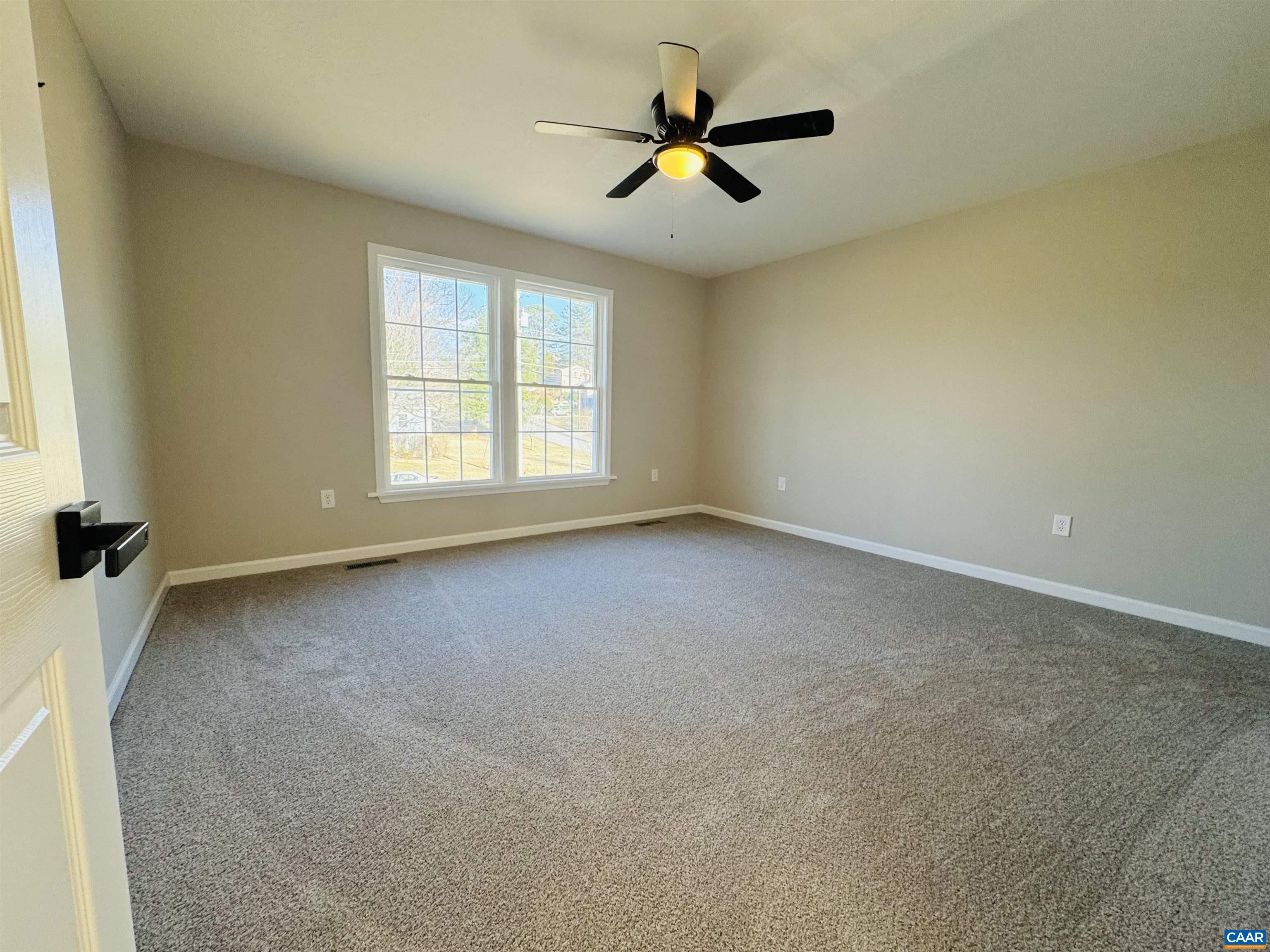 200 Robinhood Road Staunton, VA 24401 - Photo 15 of 75 an empty room with windows and ceiling fan