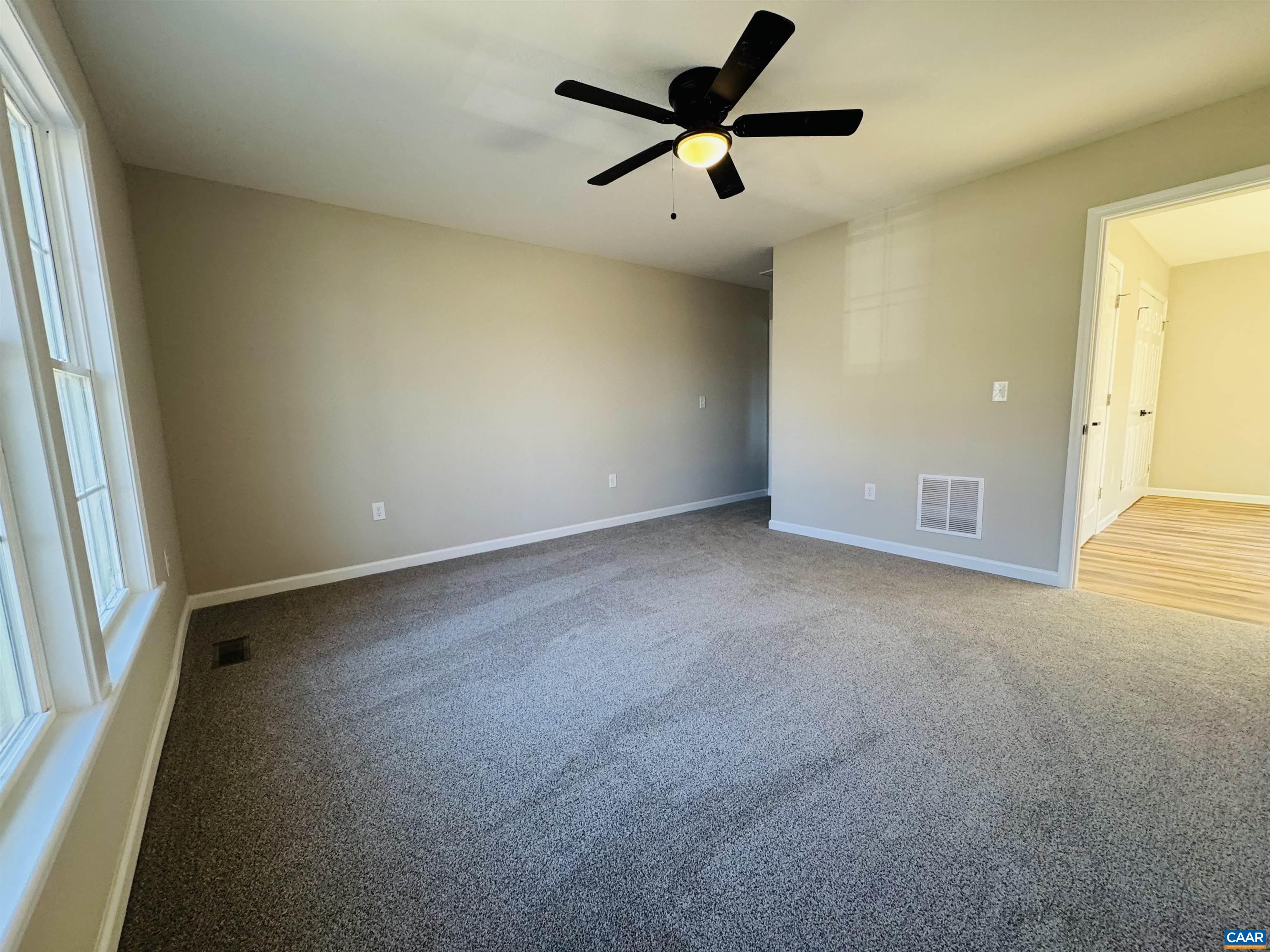 200 Robinhood Road Staunton, VA 24401 - Photo 16 of 75 an empty room with a ceiling fan and window