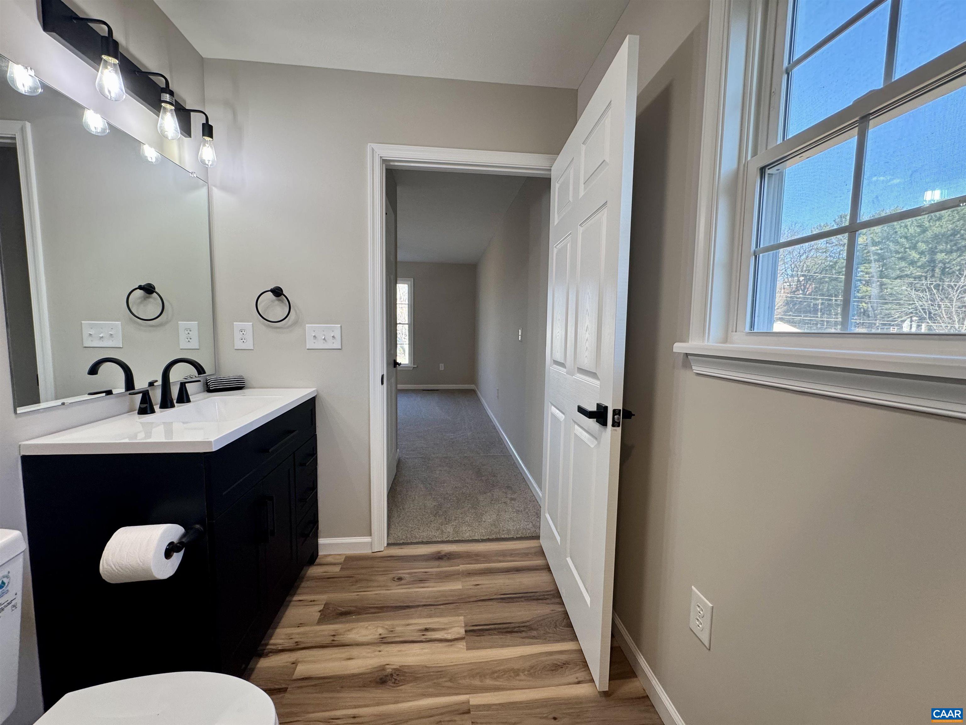 200 Robinhood Road Staunton, VA 24401 - Photo 22 of 75 a bathroom with a sink and mirror