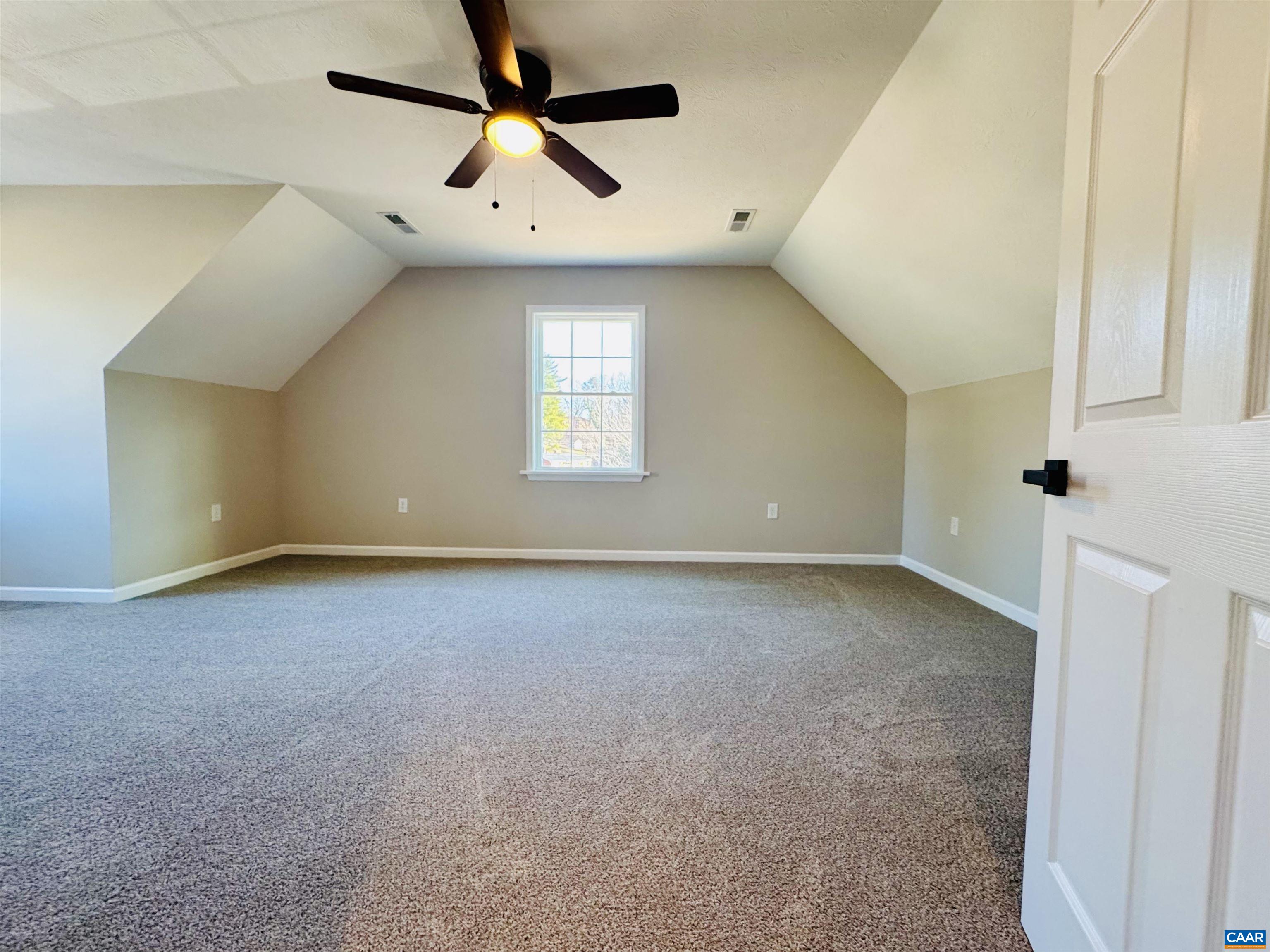 200 Robinhood Road Staunton, VA 24401 - Photo 32 of 75 an empty room with a window and a ceiling fan