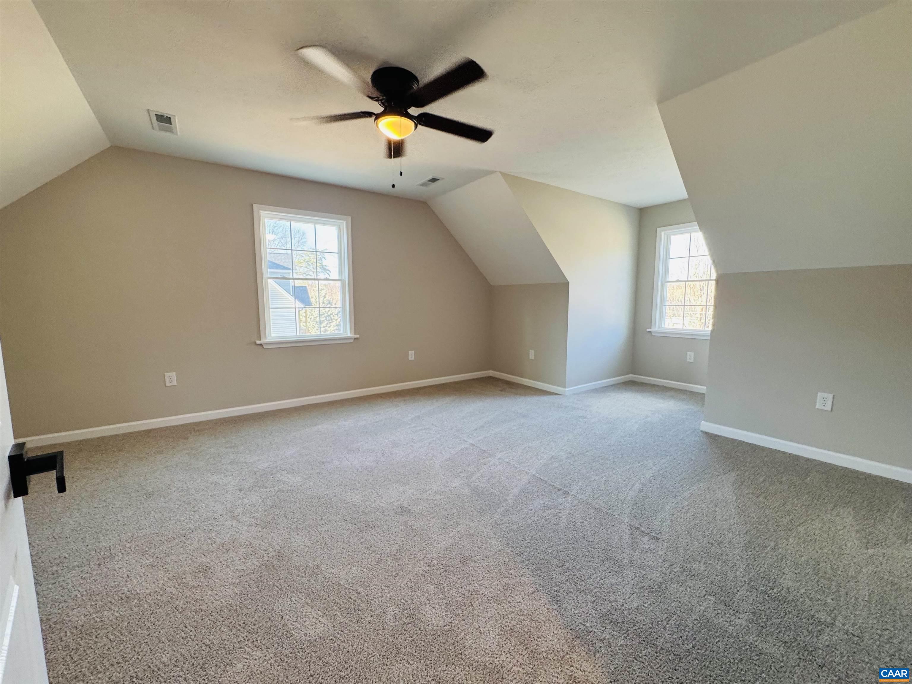 200 Robinhood Road Staunton, VA 24401 - Photo 44 of 75 an empty room with a window and a ceiling fan