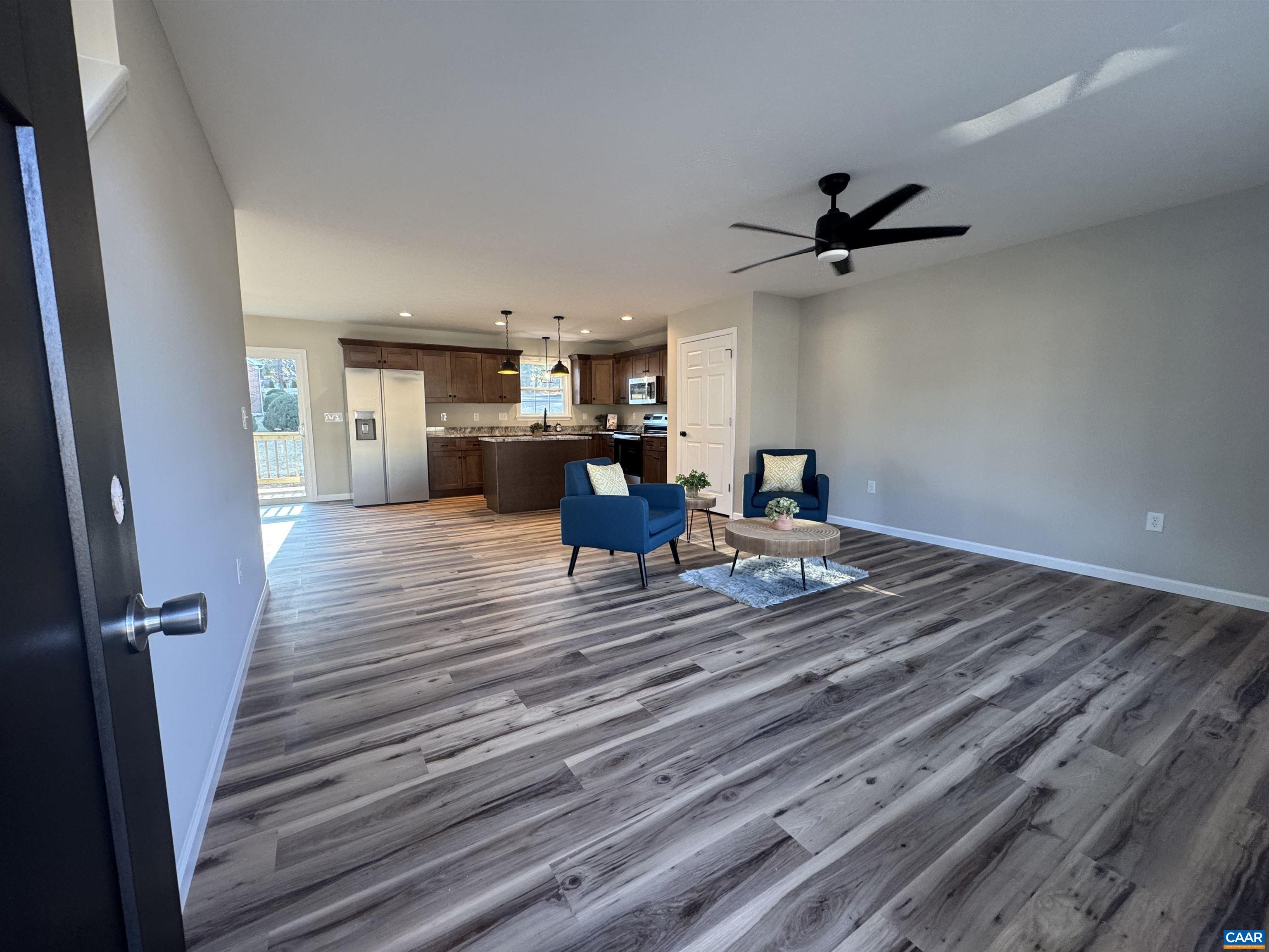 200 Robinhood Road Staunton, VA 24401 - Photo 6 of 75 a living room with a bed furniture and a ceiling fan