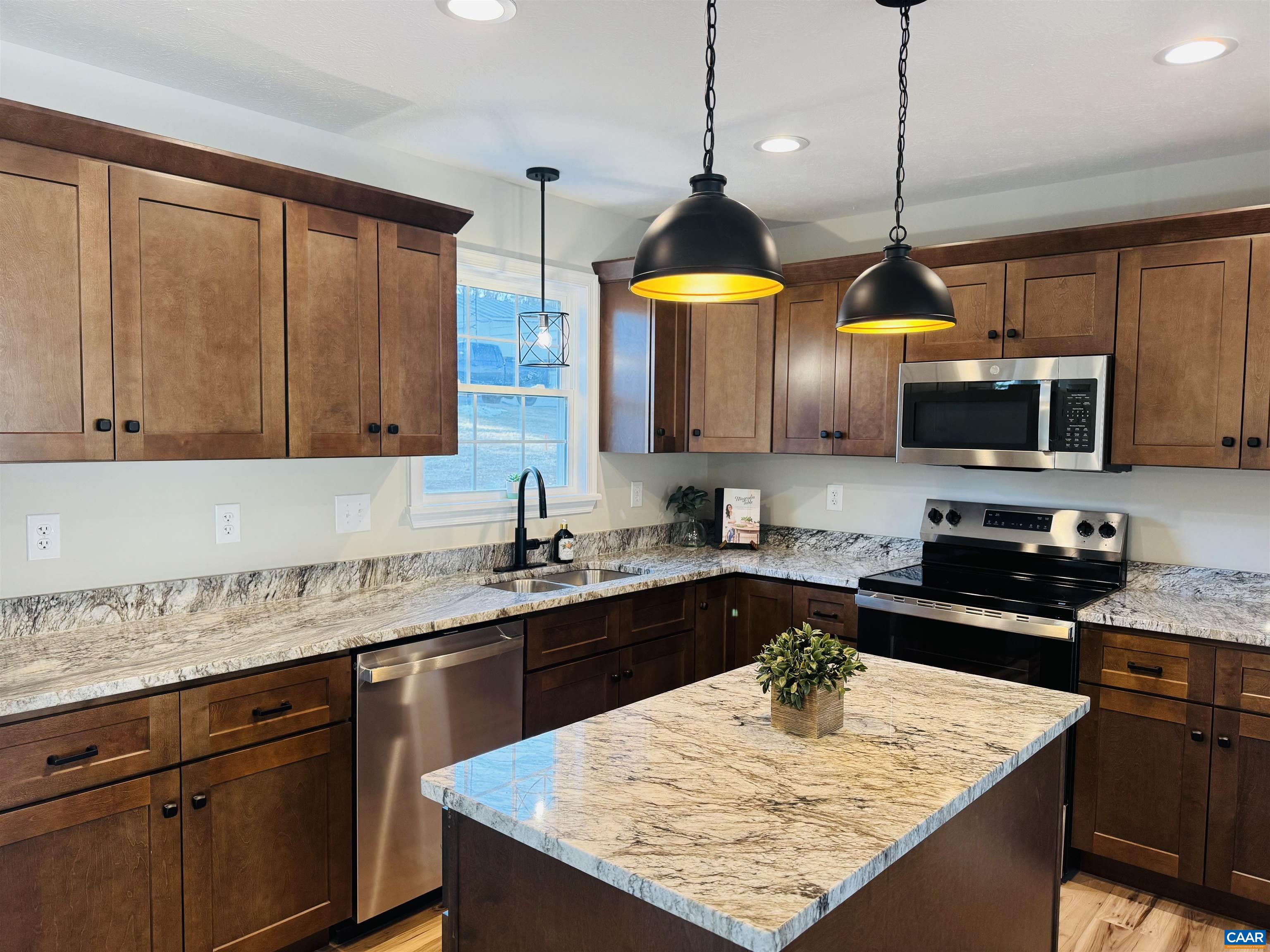 200 Robinhood Road Staunton, VA 24401 - Photo 10 of 75 a kitchen with stainless steel appliances granite countertop a sink a stove and a wooden floors