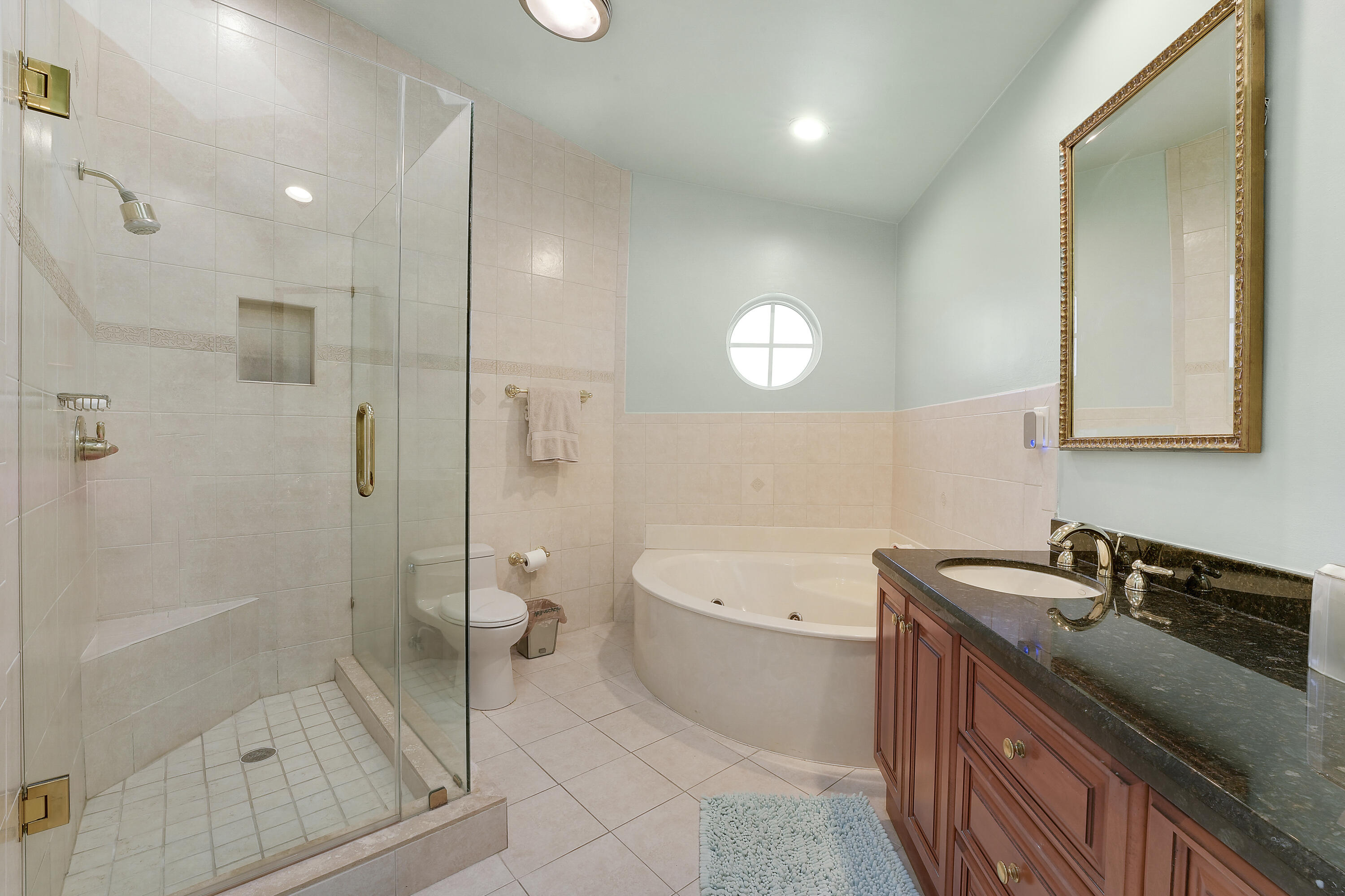 7283 Via Palomar Boca Raton, FL 33433 - Photo 26 of 43 a bathroom with a granite countertop sink a toilet and shower