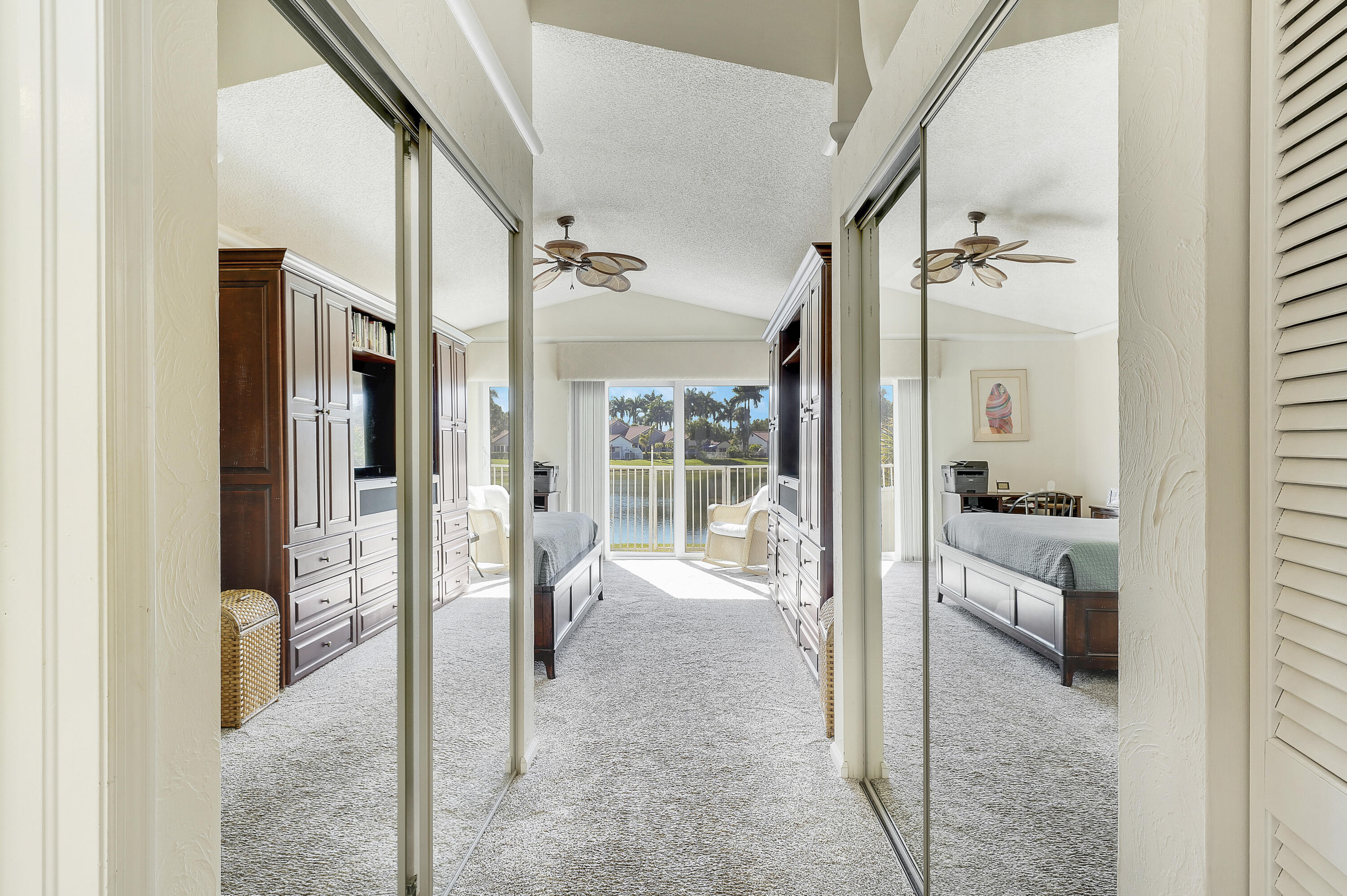 7283 Via Palomar Boca Raton, FL 33433 - Photo 27 of 43 a view of a hallway with wooden floor and a living room