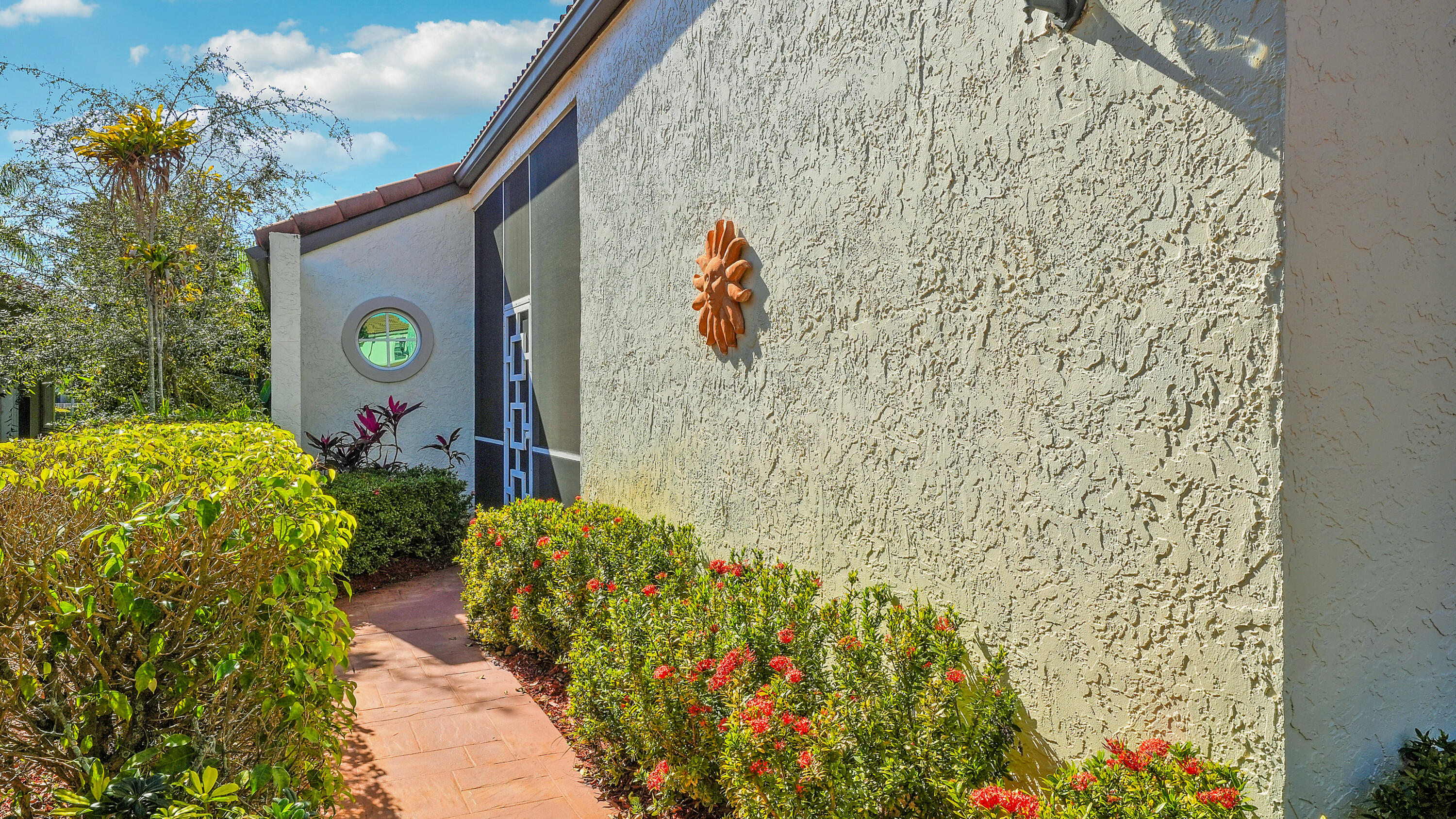 7283 Via Palomar Boca Raton, FL 33433 - Photo 3 of 43 a sign that is on the side of a building