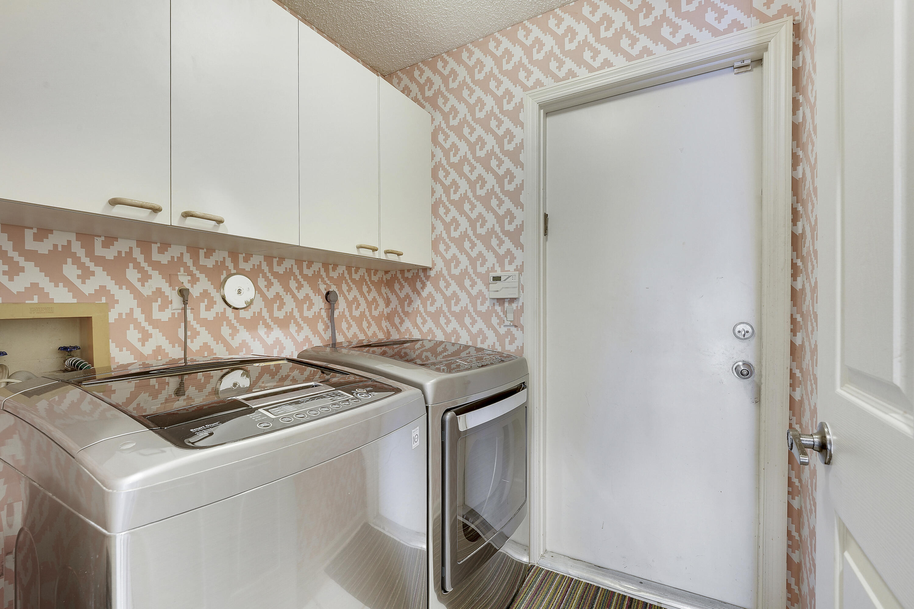 7283 Via Palomar Boca Raton, FL 33433 - Photo 32 of 43 a kitchen with a stove and a refrigerator