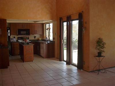 3145 Rita Court Napa, CA 94558 - Photo 4 of 10 a kitchen with stainless steel appliances granite countertop a refrigerator a sink a stove top oven a counter space and cabinets