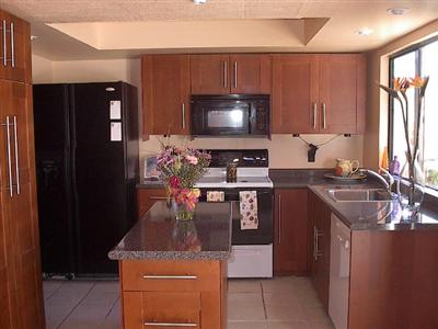 3145 Rita Court Napa, CA 94558 - Photo 5 of 10 a kitchen with a stove and a refrigerator