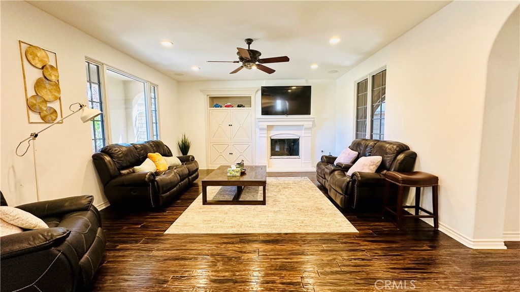 24 Silhouette Irvine, CA 92603 - Photo 12 of 36 a living room with furniture and a fireplace