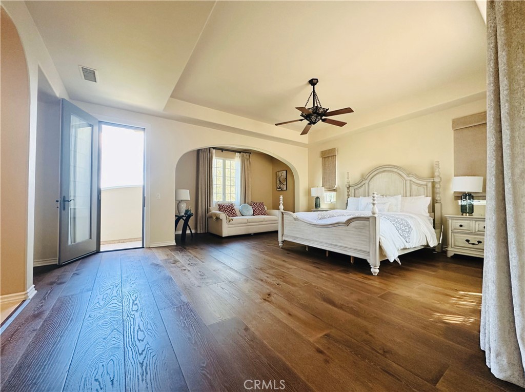 24 Silhouette Irvine, CA 92603 - Photo 15 of 36 a living room with a bed furniture and a window